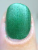 Against All Logic Nail Polish - matte green with blue sparkle - Fanchromatic Nails