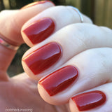 Blood Oath Nail Polish - true red creme with flecks of black & grey - Fanchromatic Nails