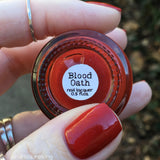 Blood Oath Nail Polish - true red creme with flecks of black & grey - Fanchromatic Nails