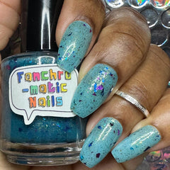 San Junipero Nail Polish - teal blue/green with shredded glitters