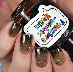 The Maze Nail Polish - color-changing black-to-clear with copper holo glitter