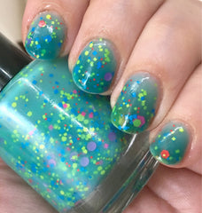 Mathematical! Nail Polish - color changing turquoise to cream with neon glitter