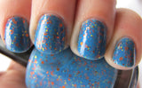 Raptor Girl Nail Polish - azure blue with orange and warm toned glitter - Fanchromatic Nails